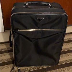 Prada rolling travel suitcase